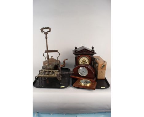 A large vintage wooden cased mantel clock, a small Swiss made one, a vintage Phillips radio, a barometer, a cast iron horse d