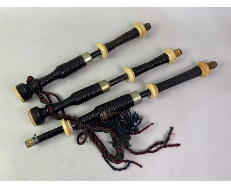 COLLECTION OF BAGPIPE PARTS, EARLY TO MID 20TH CENTURY  comprising one set of pipes without bag, these in turned dark wood wi