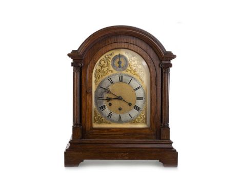 VICTORIAN OAK MANTEL CLOCK, the eight day three train movement by Gustav Becker, striking on five gongs, the brass dial with 