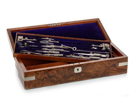 SET OF DRAUGHTSMAN'S DRAWING INSTRUMENTS LATE 19TH / EARLY 20TH CENTURY comprising a series of tools over two fitted levels, 