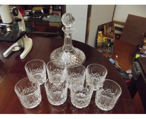 Waterford cut crystal ships decanter together with eight whisky glasses 