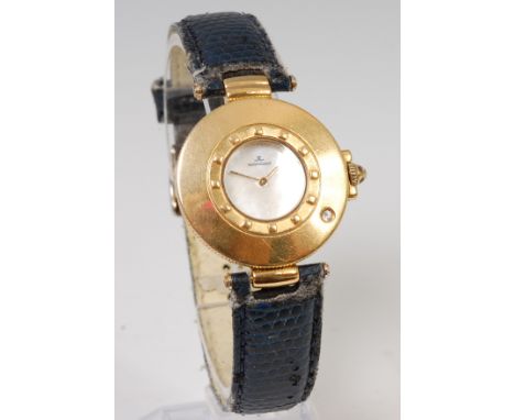 A Jaeger LeCoultre ladies 18ct gold cased wristwatch, having a signed mother of pearl dial and single diamond set wide bezel,