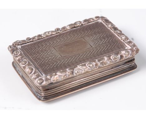 A George IV silver vinaigrette by Nathaniel Mills, engine turned and with raised and chased border, the gilt washed interior 