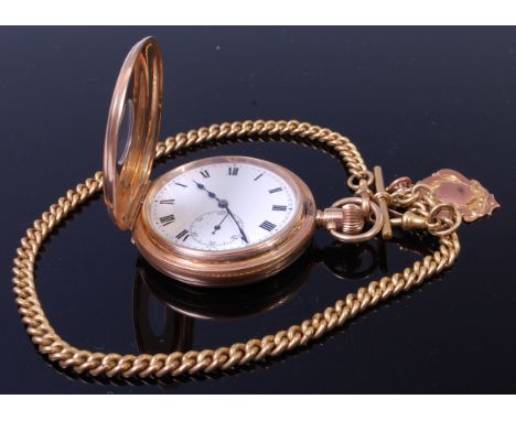 A George V 9ct gold cased gents half hunter pocket watch, having white enamel dial with subsidiary seconds dial, gold inner b