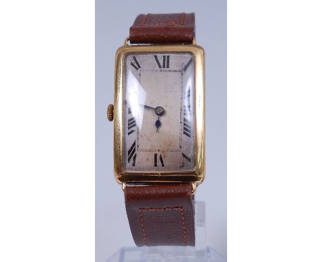 A vintage gents 18ct gold P.W.C. tank watch, having a silvered dial with Roman numerals, left hand winding Swiss movement, th