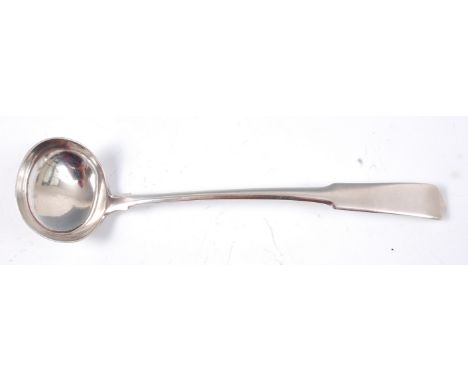 An early 19th century Scottish provincial silver sauce ladle, in the Fiddle pattern, makers mark for George Constable struck 