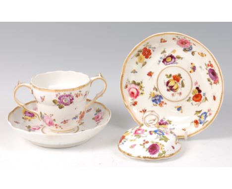 An early 19th century Derby porcelain chocolate cup on stand, enamel decorated with floral sprays and insects on a white grou