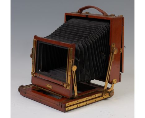 A circa 1900 mahogany and brass mounted "Stereo Victo" plate camera, having black bellows, with Thornton Pickard patent Beck 