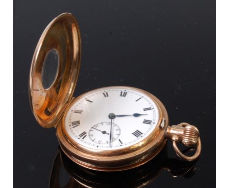 A George V 9ct gold gents half hunter pocket watch, having white enamel dial with subsidiary seconds dial, gold inner back co