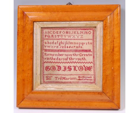 An early Victorian needlework alphabet and religious verse sampler, bearing legend 'God is Love', dated 1848 and signed for M