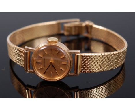 A modern Longines 9ct gold cased ladies wristwatch, having a signed dial with baton markers, manual wind movement, and origin