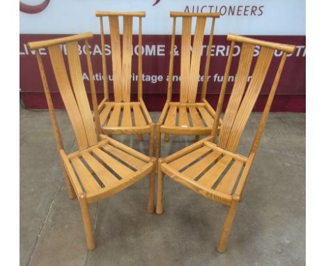 A set of four Ercol Blonde ash Saville dining chairs 