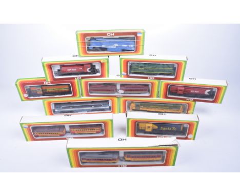 Eleven boxed Mehano Tehnika Izola HO gauge locomotives(two Continental and nine American), comprising three tram car sets for