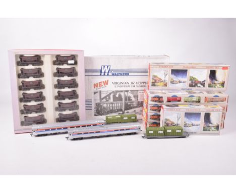 Nineteen boxed Walthers HO gauge itemsComprising twelve boxed Virginian 36 foot hopper kits, ORE cars 12 pack, bogey flat car