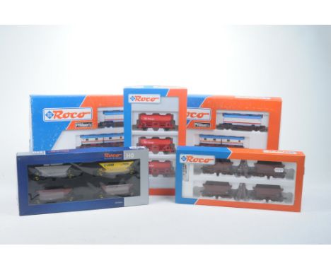 Six boxed Roco HO gauge goods setsComprising 2x 44130 William's Circus, 2x 44188 DB Cargo wagons, 67062 Hopper Wagons, and 44