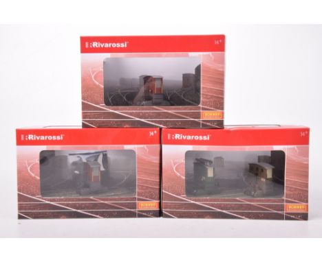 Three boxed Rivarossi/Hornby International setsComprising No. HR2072 double unit marshalling tractor and 2 x HR2204 marshalli