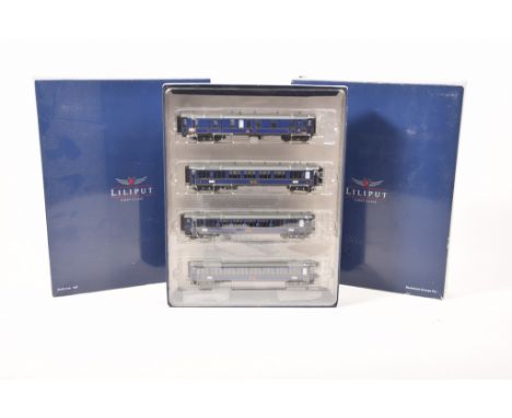 Three boxed Lilliput Bachmann Europe Plc HO gauge four piece coach setsNo. L350115 in blue GB livery.