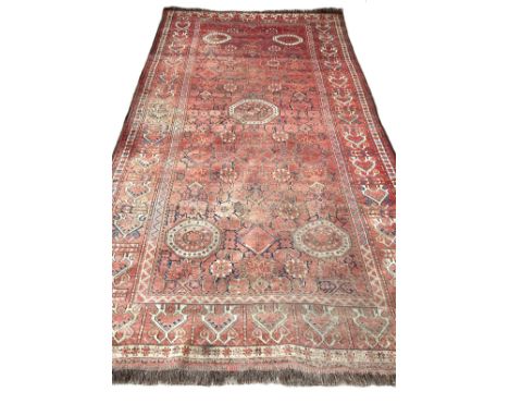 An interesting Beshir Kelleh carpet, probably Turkmenistan, circa 1900, the central field with five distinct guls within othe