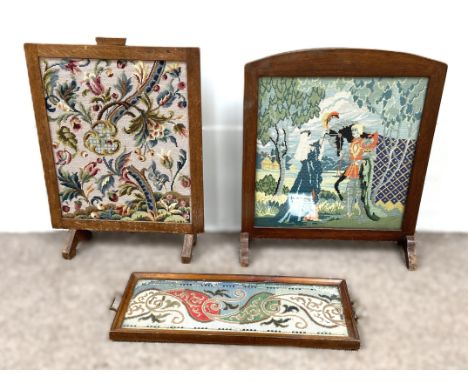 A Victorian decorative tapestry inset tea tray, with brass side handles; also a tapestry inset firescreen and a tapestry tray