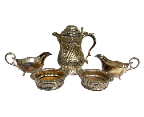 An impressive silver plated Queen Anne Style baluster covered jug, with embossed decoration and scroll handle; also a pair of