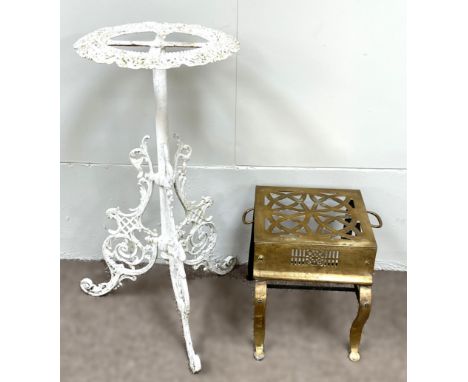 A 19th century brass ‘Footman’, with pierced top and curved feet, 37cm wide; also a vintage painted white garden stand (2)  A