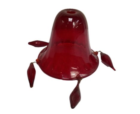 A large ruby glass five light chandelier, believed Murano, Venice, probably circa 1970,  with five scroll arms holding bell s