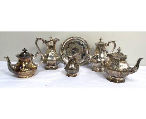 A late Victorian silver plated four piece tea and coffee service; together with a tray and two other plated pieces (6)