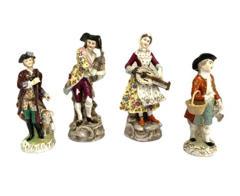 A pair of Dresden porcelain figures of a Lady and Gallant, dressed for hunting, she with a musket and spaniel, he with a shot