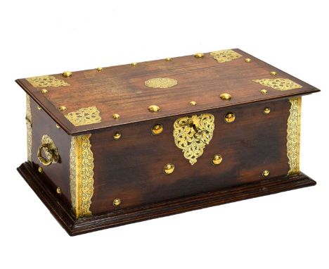 18th century Colonial brass-mounted padouk chest or trunk, in the Dutch East India Company taste, the hinged rectangular cove