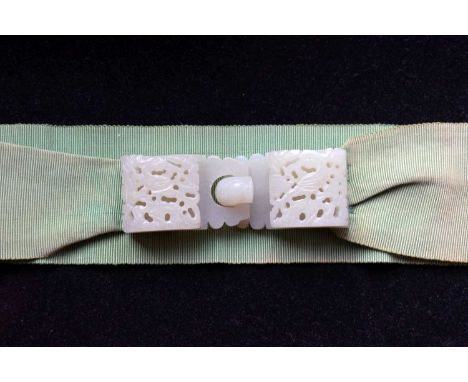 Chinese carved celadon jade two part belt buckle, late Qing dynasty or Republican, each section with pierced square panel dec