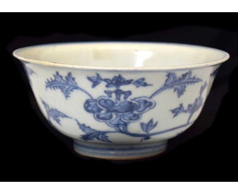 Chinese blue and white porcelain Ming style bowl, of slightly flared form, decorated with flowers and foliage between ring ma