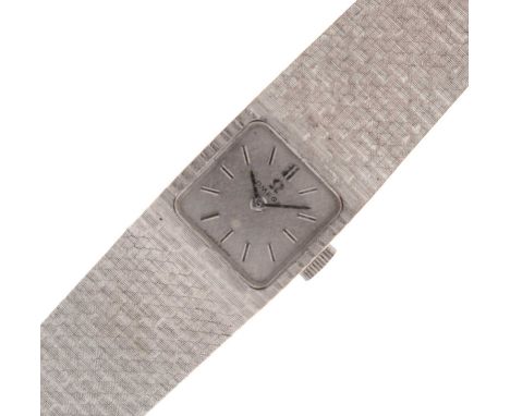 Omega - Lady's 1970s 18ct white gold bracelet watch, the textured silvered square dial with baton hour markers, signed crown,