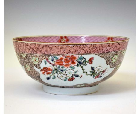 19th century Chinese Canton Famille Rose porcelain footed bowl, painted with panels of flowering peonies and prunus on a scro