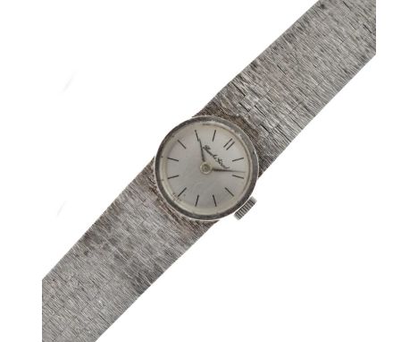 Bueche Girod 9ct white gold lady's wristwatch, circular face, baton markers, diameter 15mm approx, integral textured strap, w