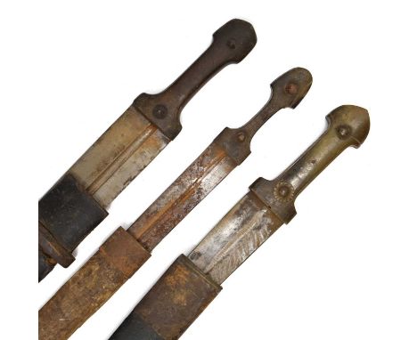 Three Caucasian Kindjals, the first with broad 43cm blade with offset fullers, characteristic hilt with riveted horn grip, co
