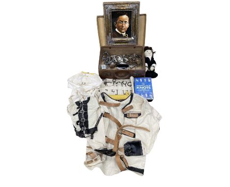 Amateur magician / Houdini interest - A suitcase containing a quantity of escapologists equipment, to include:  - Various han