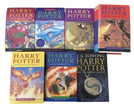 A set of hardbound Harry potter books, to include: - Philosopher's Stone:  - Chamber of Secrets - Prisoner of Azkaban - Goble