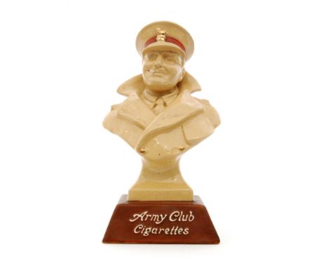 A Royal Doulton Army Club Cigarette advertising bar top bust of a  colonel in greatcoat, cap and monocle, with lit cigarette 