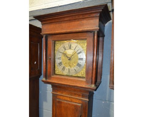 An early 19th oak longcase clock with thirty hour movement, the engraved brass dial signed 'James Freeman, Bristol', with sil