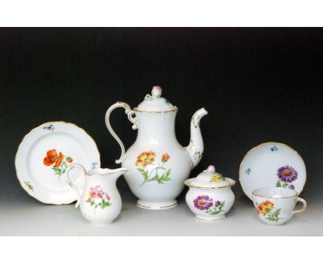 An early 20th Century Meissen Deutsche Blumen twelve place teaset comprising teapot, sucrier, milk jug, twelve cups, twelve s