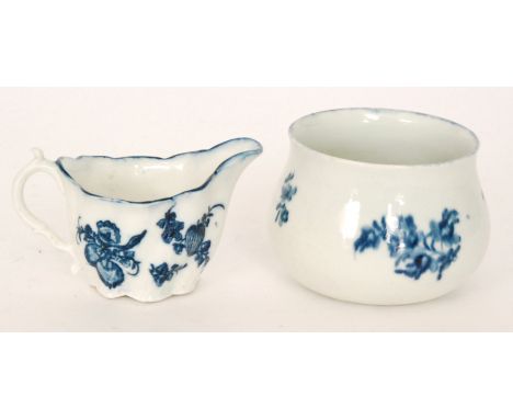 A late 18th Century Caughley 'Chelsea Ewer Creamboat' decorated in the Apple and Damson pattern, length 11cm together with an