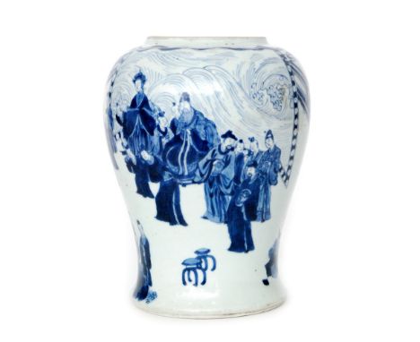 A 19th Century Chinese vase of inverted baluster form decorated in blue and white with figures in a garden setting beside a f