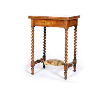 A 19th Century floral marquetry inlaid card table, the rectangular folding top opening to reveal a baize interior above a sin