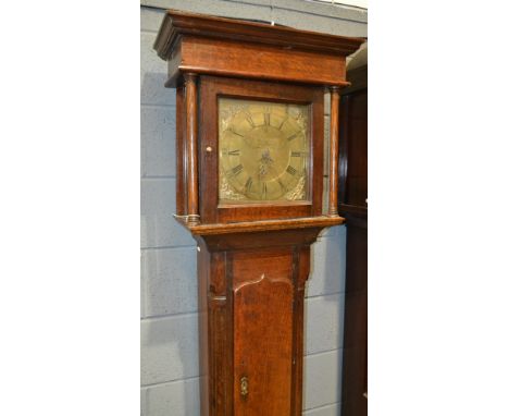 An early 19th Century and later oak cased longcase clock, the brass dial inscribed Jn Lewis Llanidloes, with thirty hour move