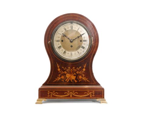A late 19th Century inlaid mahogany balloon shaped mantle clock with fusee movement striking on a gong, the case decorated wi
