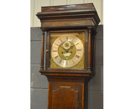 An 18th Century and later cased oak longcase clock, the silver chapter ring inscribed 'William Glover, Worcester' and with su