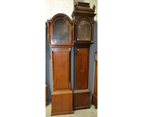 A 19th Century stained oak longcase clock case with arched hood and turned ovoid finials, height 250cm, together with a simil