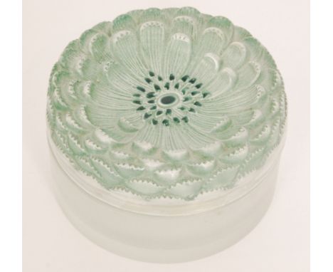 Amended description - A 1930s Rene Lalique Dahlia pattern powder box and cover of circular form, the lid relief moulded in th