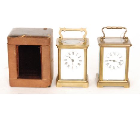 A late 19th Century French brass carriage clock with white enamelled dial, height 10.5cm and leather carrying case and a simi
