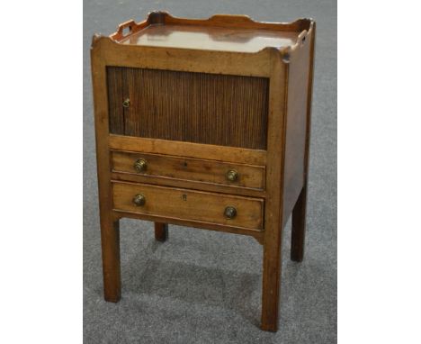 A George III mahogany tray top bedside commode with louvred cupboard door above two drawers on square tapered legs, width 50c